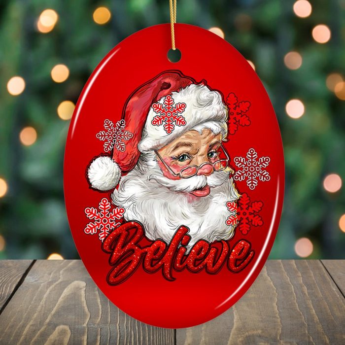 FORPRODUCTVintageBelieveSantaChristmasOrnamentMockupGroup 08 1 blurred gold garland christmas tree as background wooden tabletop as foreground christmas abstract image display montage