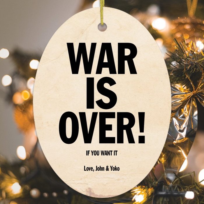 VintageWarisOver IfYouWantIt.LoveJohn YokoChristmasOrnamentCloseUpGoldOrnamentsandLightTreeMockup