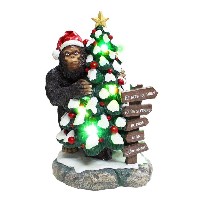 WBM 01 Whimsical Bigfoot Behind Christmas Tree Figurine 7.5 Funny Holiday Yeti LED Statue He Sees You When You re Sleeping