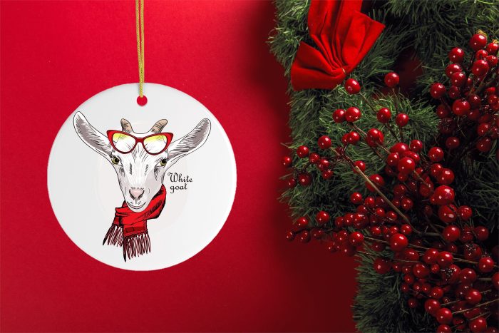 WinterGoatChristmasOrnamentRedWallandTreewithCherriesHeartOrnamentMockup scaled